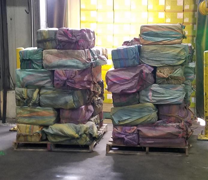 60 Bundles filled with cocaine kilograms removed from container