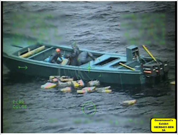 Defendants throwing cocaine overboard