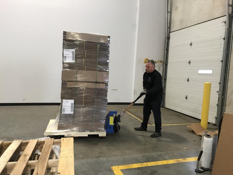 DEA personnel preparing collected drugs for proper disposal