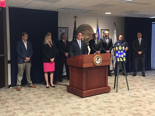 DEA Special Agent in Charge Brad L. Byerley talks to the media at press conference.
