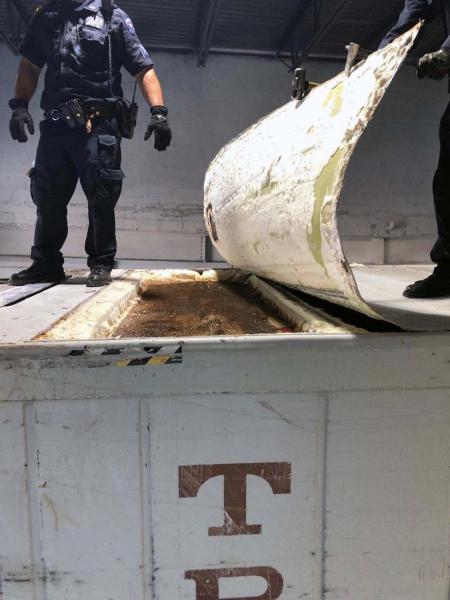 Concealed compartment found on top of container