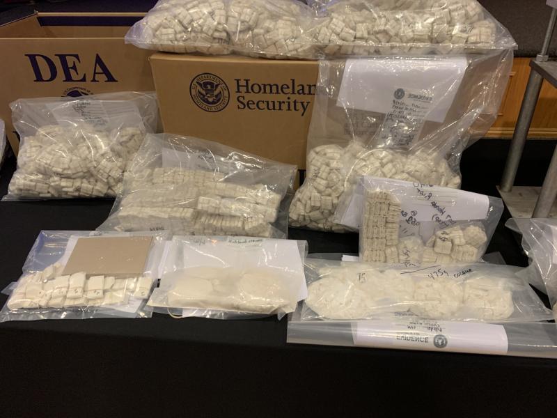 88,000 heroin glassines and 1,000 grams of cocaine seized