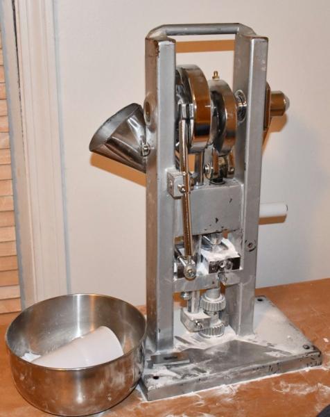 Tableting machine for making counterfeit pills