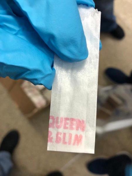 Stamp "Queen & Slim" branded on glassine bags