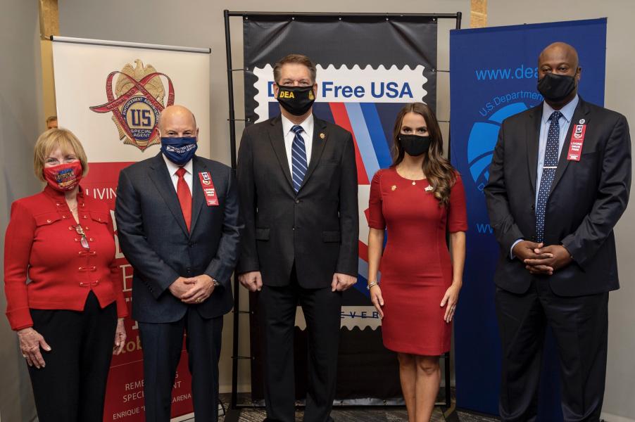 Left to Right: President of the National Family Partnership, Peggy Sapp, Postmaster General Louis DeJoy, DEA Acting Administrator Timothy Shea, Miss America 2020, Camille Schrier, and Chief Postal Inspector Gary Barksdale,