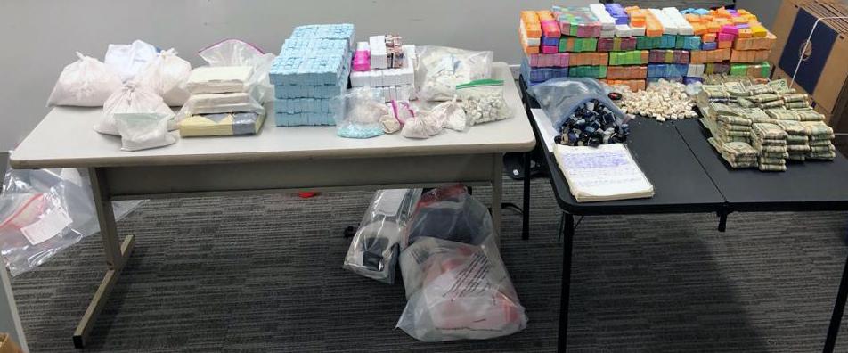 Drugs and drug proceeds seized from multi-million dollar mill