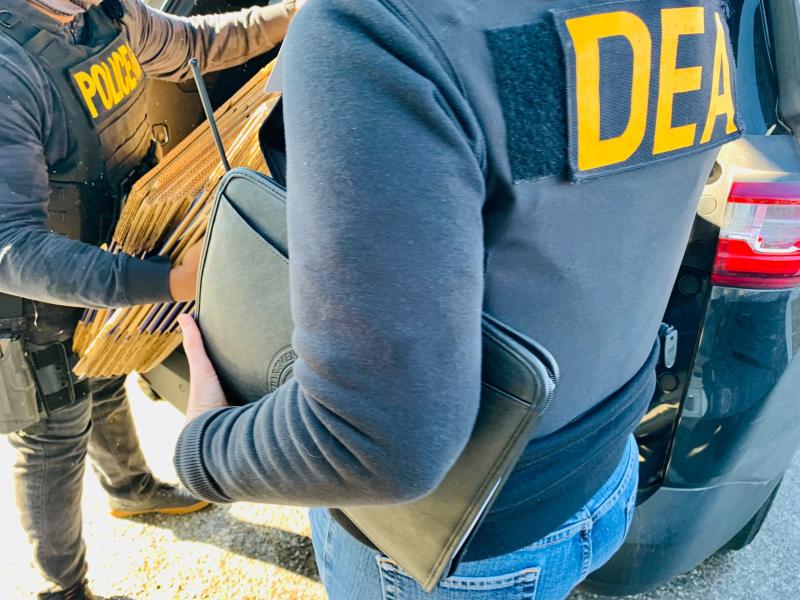 DEA Agents at Pharmacy Serving ISO and Removing Controlled Substances from Scene