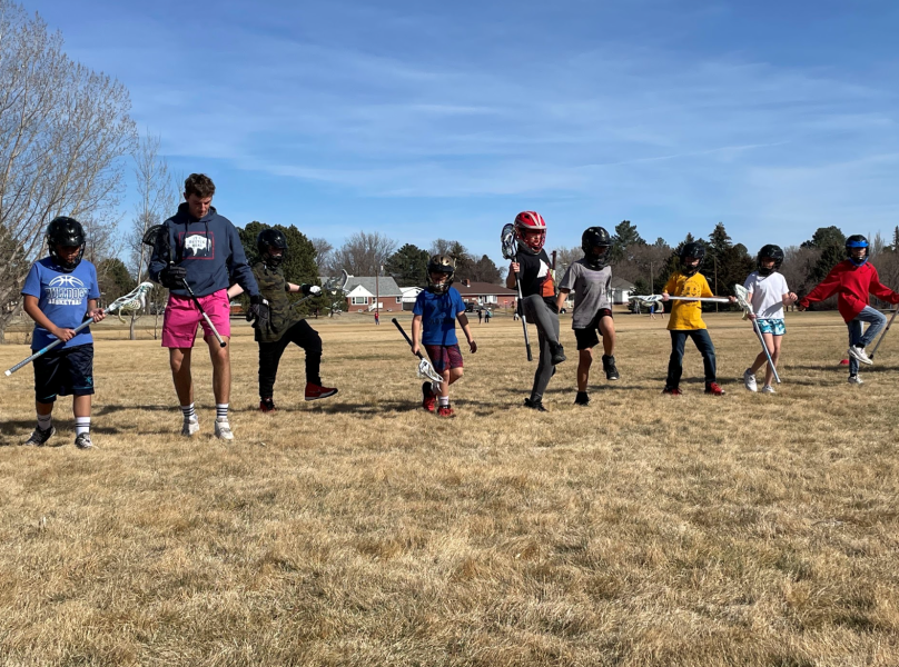 Students in Alliance, Nebraska practice lacrosse after school.
