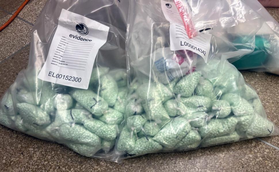 Fake Pills Seized, blue and stamped M-30