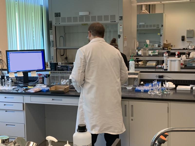 scientist standing in the lab testing nitazene