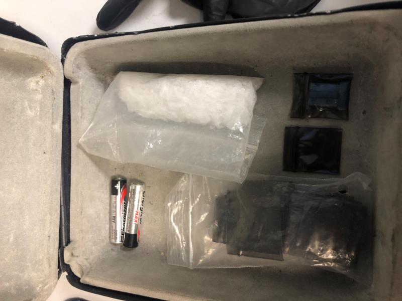 lock box on the floorboard of the driver’s seat which contained meth
