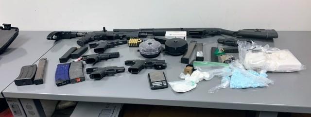 Illegal firearms and fentanyl pills seized