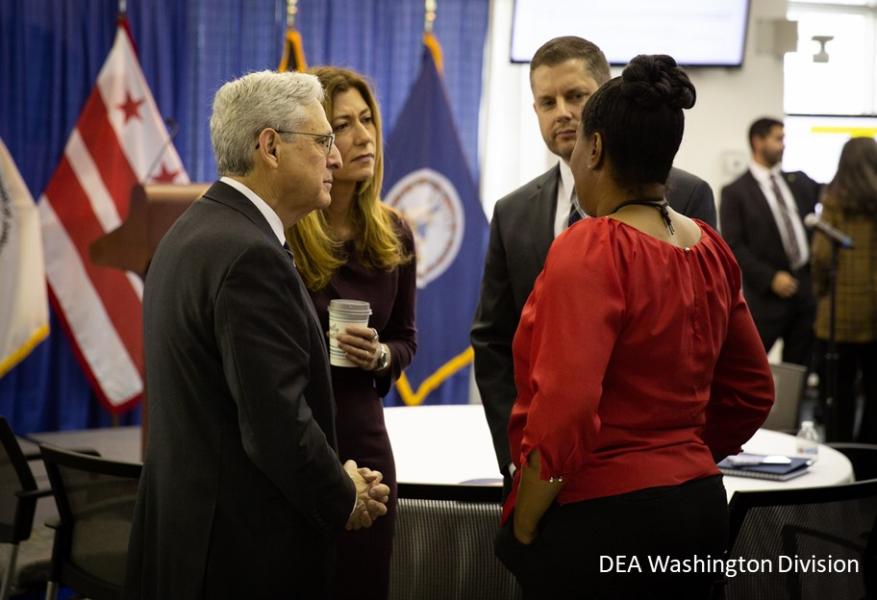 U.S. Attorney General Merrick Garland, DEA Administrator Anne Milgram, DEA Washington Division Special Agent in Charge Jarot Forget and D.C. resident LaMonica Jeffrey