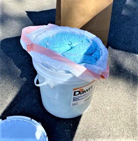 Thousands of pills in 5 gallon bucket.