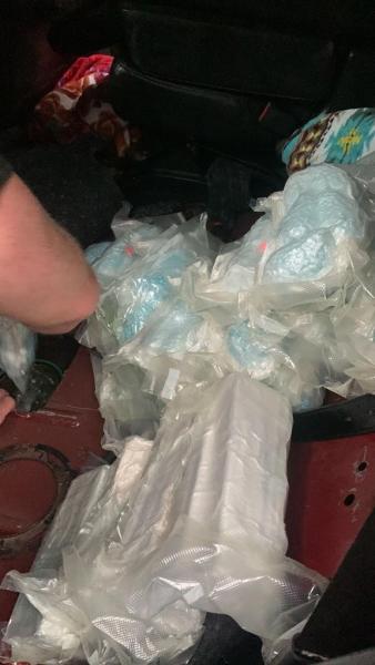 close up of fentanyl kilograms and pills