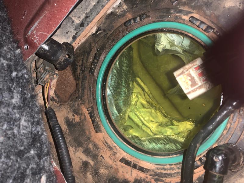 gas tank located in vehicle's rear floorboard