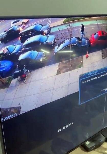 Sophisticated surveillance system with view of front of building