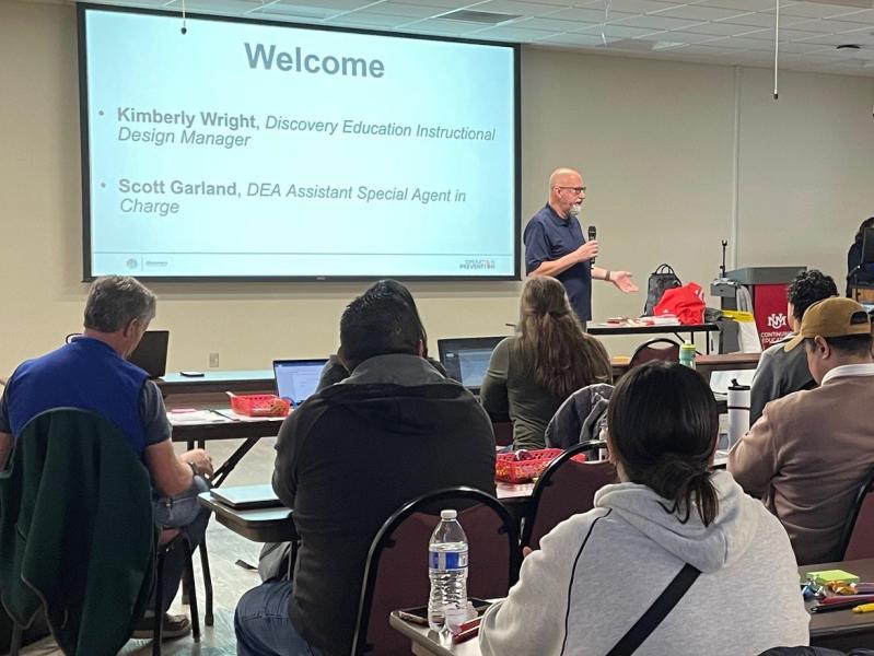 Albuquerque District Office ASAC Garland welcomes APS educators to the training.