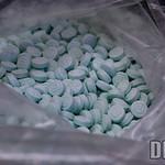 Blue fentanyl pills in a bag.