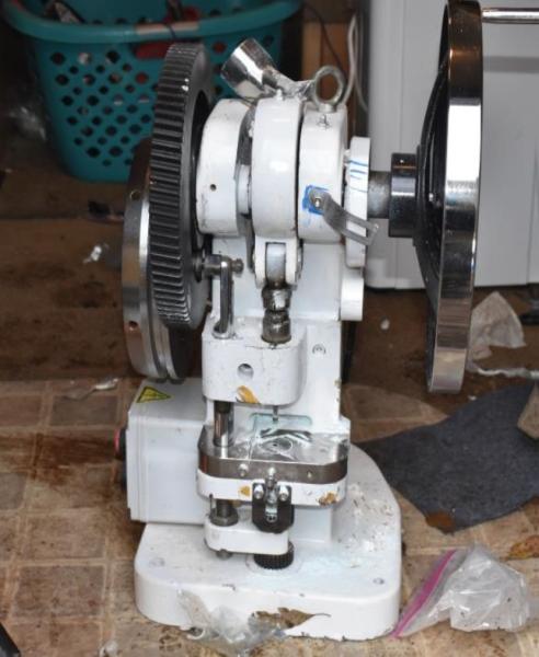 Seized pill press.
