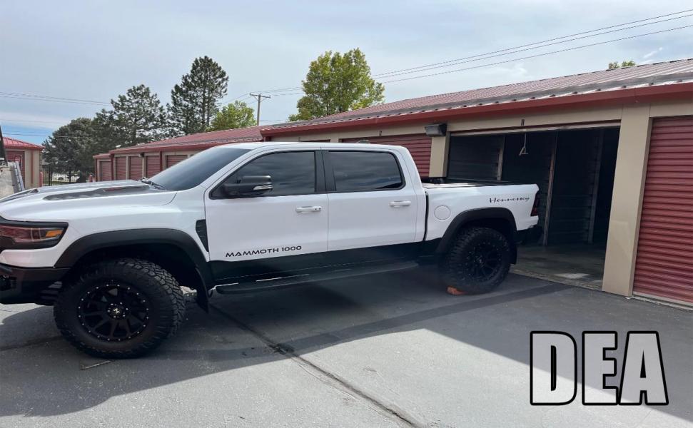 White Truck in front of storage unit