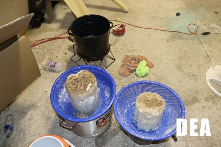 The photo above was included in Ignacio Manzo Cardenas’s filed Factual Resume and shows two large blocks of methamphetamine on a strainer drying in the middle of the shop.