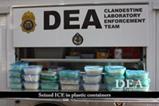 Seized ICE in plastic containers.