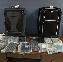 Suitcases and cocaine seized at the Luis Munoz Marin International Airport.