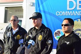PRPD-DEA Task Force Lieutenant Jorge Estrada, DEA Assistant Special in Charge Israel Alicea and PRPD-DEA Task Force Lieutenant Jesus Figueroa take questions from the media during a news conference announcing results of the arrest operation. 