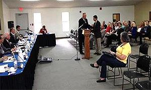 Corrections Director Joe M. Allbaugh accepting a commendation on behalf of the DOC from DEA Resident Agent in Charge Carl Stewart for the agency's work during a recent investigation