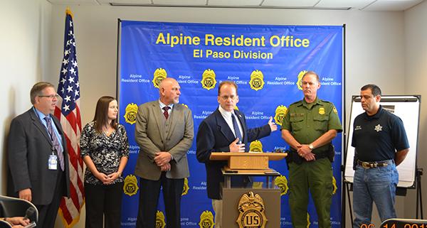 DEA Investigators and law enforcement officers entering the distribution center.