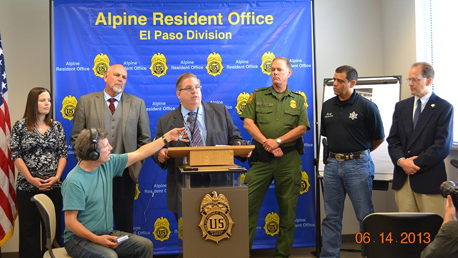 DEA Investigators reviewing inventory in the distribution center.