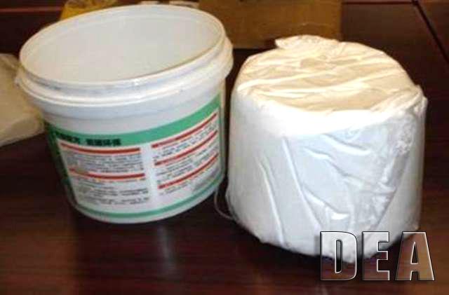 DEA-led Operation Cyber Juice targeted every level of the illegal underground steroid market.  Shown here are steroid vials and barrels of raw steroid powder seized as part of the operation.  These dangerous steroids and raw material came from China. 