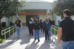 DEA Investigators and law enforcement officers entering the distribution center.