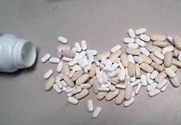 Hydrocodone concealed in a vitamin bottle.