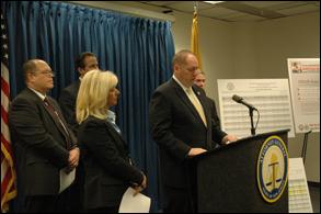 DEA New Jersey Field Division Special Agent in Charge Brian Crowell, at podium, delivers an opening statement at the press conference.