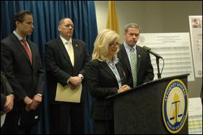 Mrs. Meg Dupont-Parisi of Mothers Against Prescription Drug Abuse, at podium, provides remarks on behalf of her organization. 