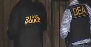 Louisiana State police officer and a DEA agent from the Lafayette Post of Duty conducting a search warrant at Desperado’s Cabaret.