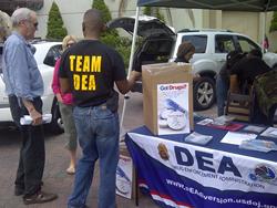 DEA employees in New Orleans, LA taking back drugs on a previous prescription drug take-back day.