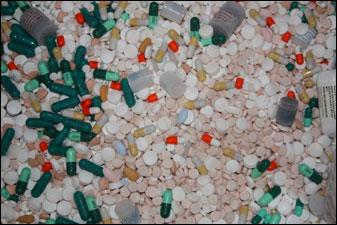 Box filled with unused or expired medication collected during a Take-Back Day event.