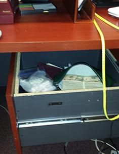 Approximately $10,000 (all in $20 dollar bills) found in Dr. Ali’s desk next to several loose hydrocodone and oxycodone tablets in a plastic bag.