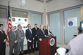 ASAC James R. Burns Jr. at the podium. L-R (background): RAC Dale Kasprzyk, Gary Baldauf Regional Director Medicaid Fraud, U.S. Attorney William J. Hochul, Jr., Niagara County Sherriff James R. Votour, Niagara Falls Chief of Police John R. Chella.