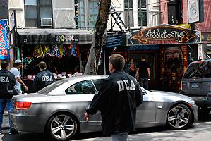 DEA Agent outside one of the shops allegedly selling “bath salts.”