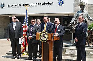 DEA Agent outside one of the shops allegedly selling “bath salts.”