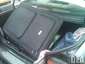 Suitcase used to transport meth and heroin from tractor trailer to vehicle.