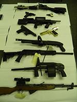 Some of the guns seized in a series of searches in Pennsylvania.