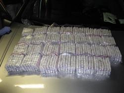 Heroin bundles found in the Santos vehicle