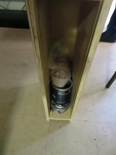 TV stand with tower storage components containing heroin.