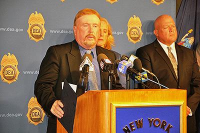 Acting SAC Hunt addressing the press at the press conference.