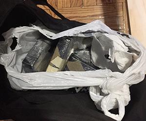 Heroin bricks seized at  an apartment at 20 Laurel Hills in Manhattan.